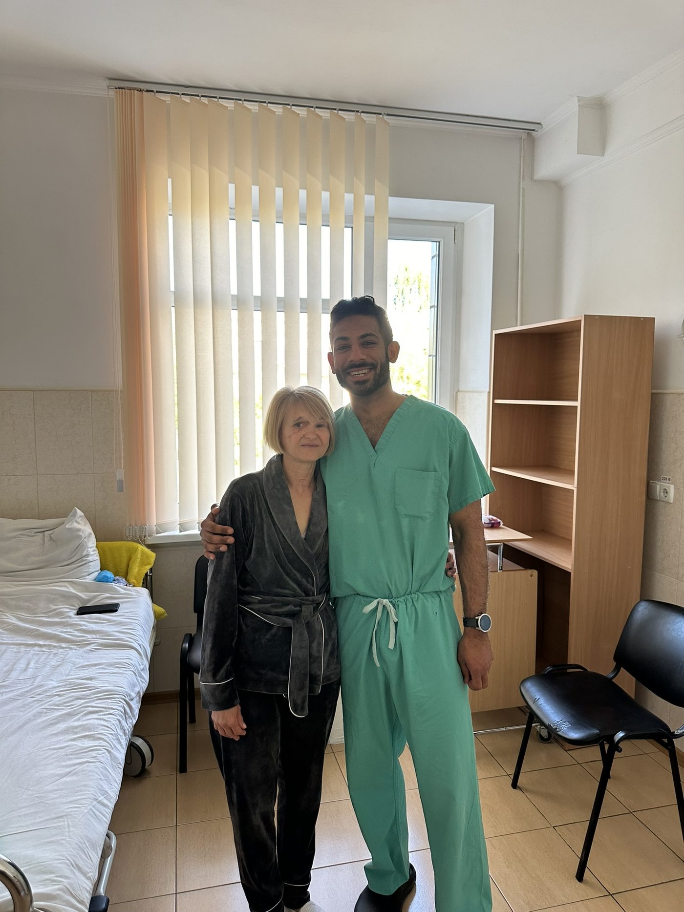 Dr. Gidumal with a reconstructive patient in Kyiv