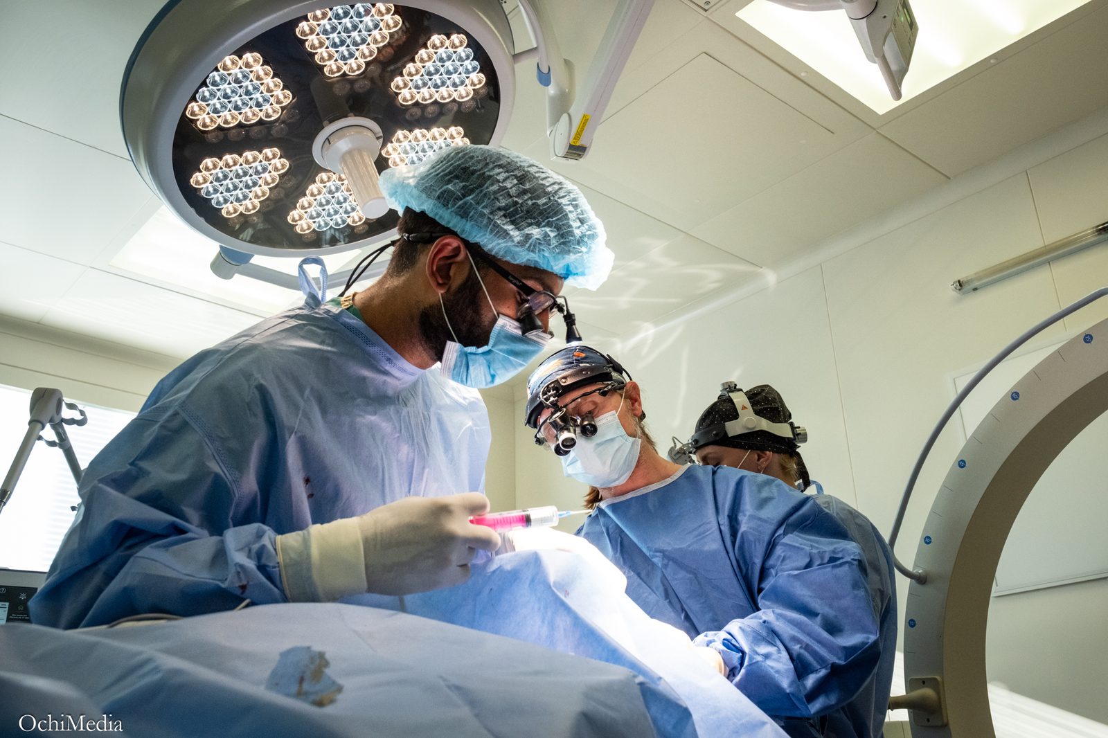 Dr. Gidumal performing facial reconstruction with the surgical team in Kyiv